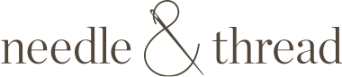 The logo of Em Prov's client, Needle & Thread