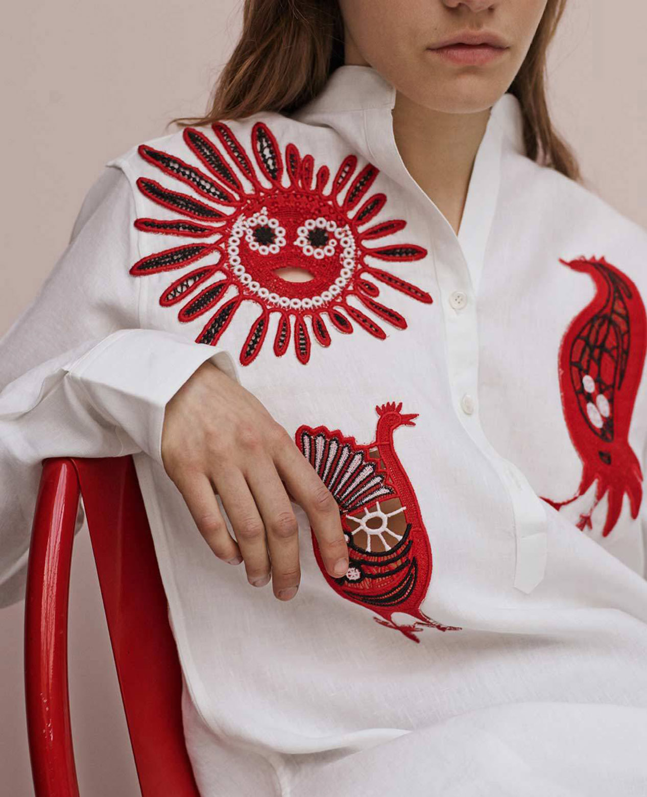 Folk sun and birds designs by Em Prov, embroidered on Celine shirt